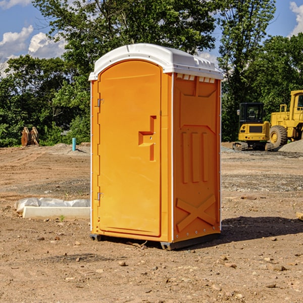 what is the cost difference between standard and deluxe portable restroom rentals in Akron